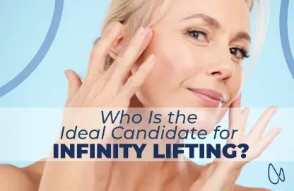 A woman touching her cheeks gently, showcasing lifted facial contours after Infinity Lifting at Estetik International.